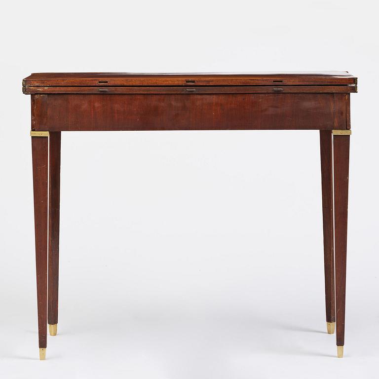 A Gustavian 'concertina action' mahogany games table by Georg Haupt (master in Stockholm 1770-84).