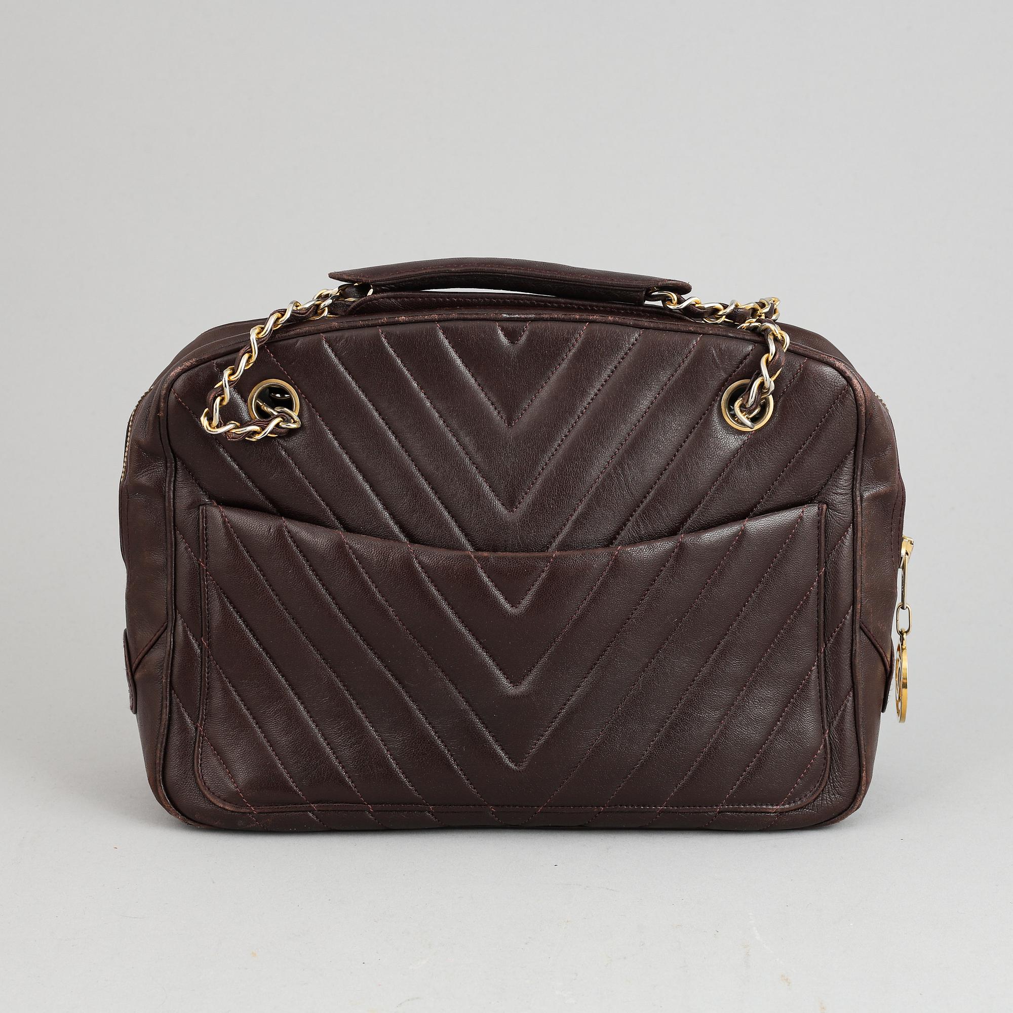 Chanel, a burgundy leather handbag, 1989-91.