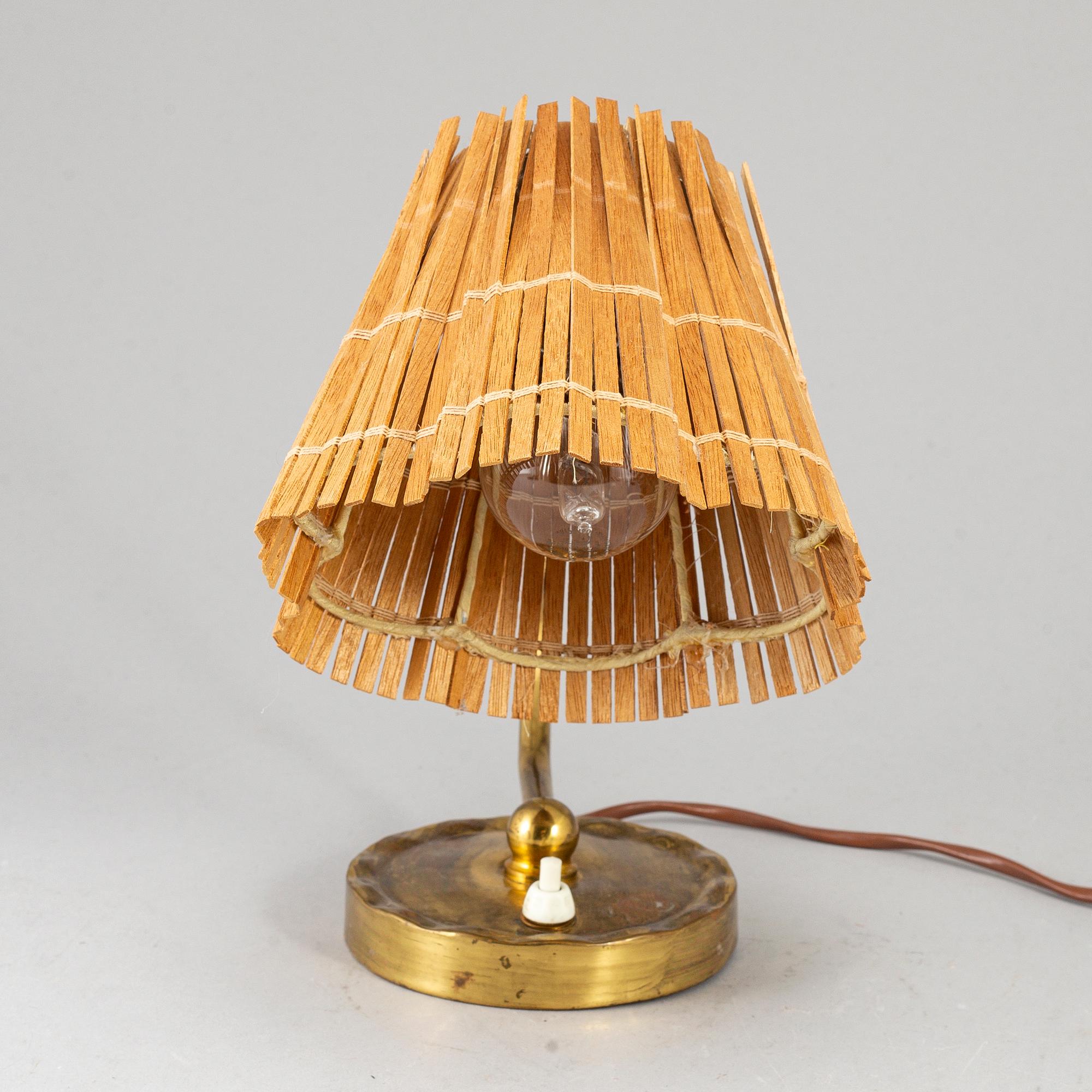 PAAVO TYNELL, a model 61032 table light from Idman, Finland.