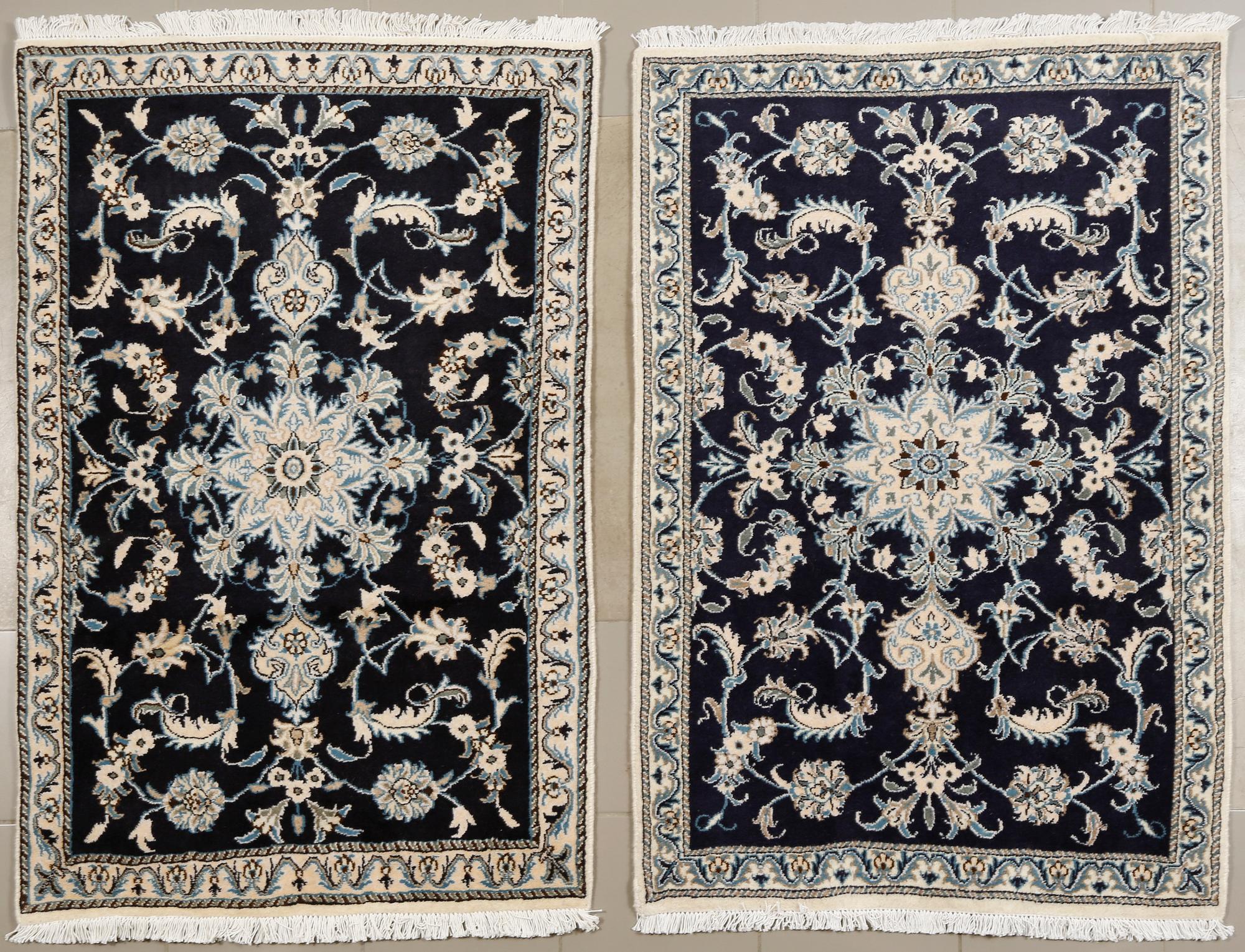 Two Nain rugs, 135 x 90 cm.