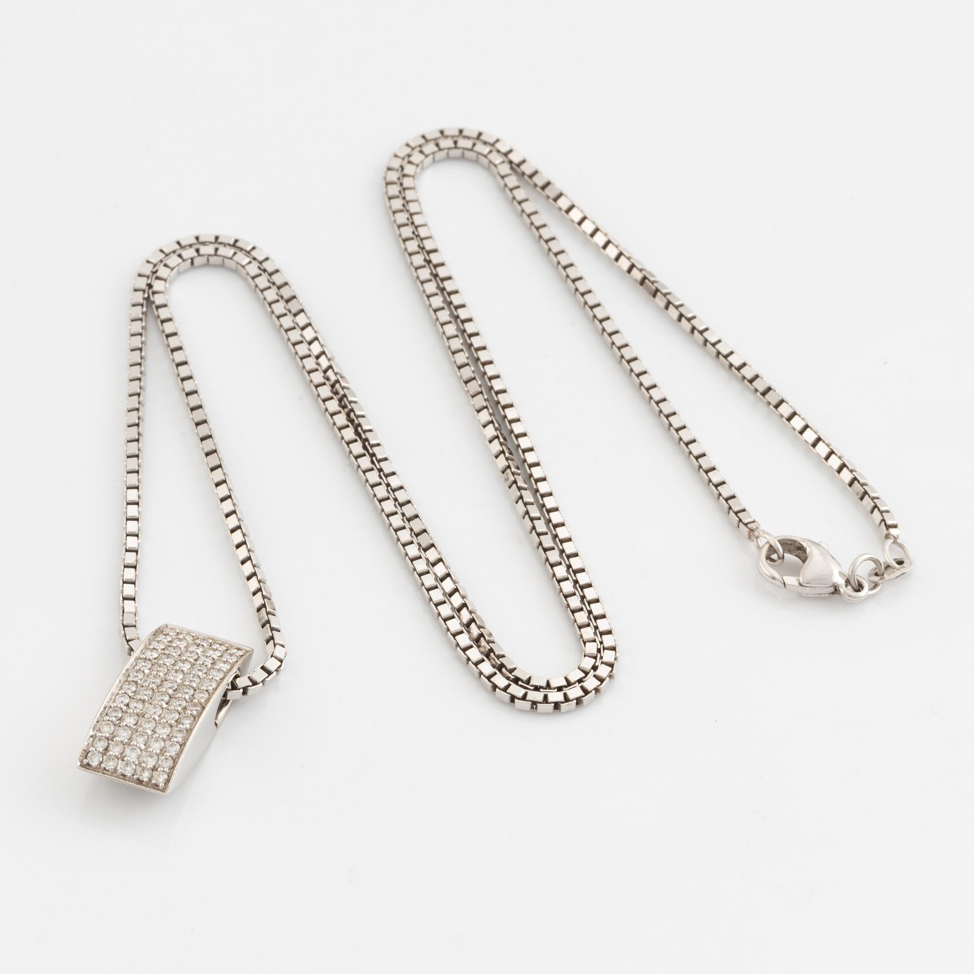 White gold and brilliant cut diamond necklace.