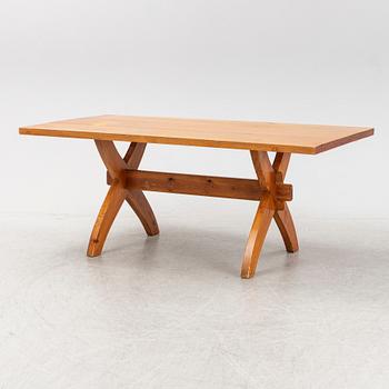 A pine trestle table, later part of the 20th Century.