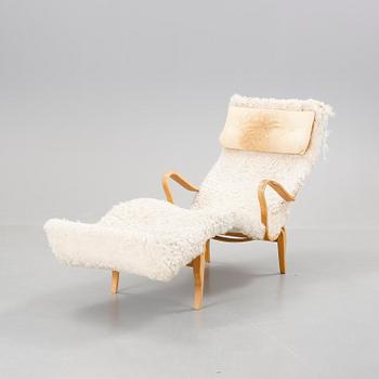 LIGGFÅTÖLJ, "Pernilla", brännmärkt Bruno Mathsson design.