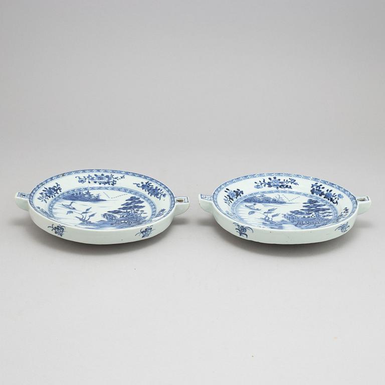 A pair of blue and white hot water dishes, Qing dynasty, Qianlong (1736-95).