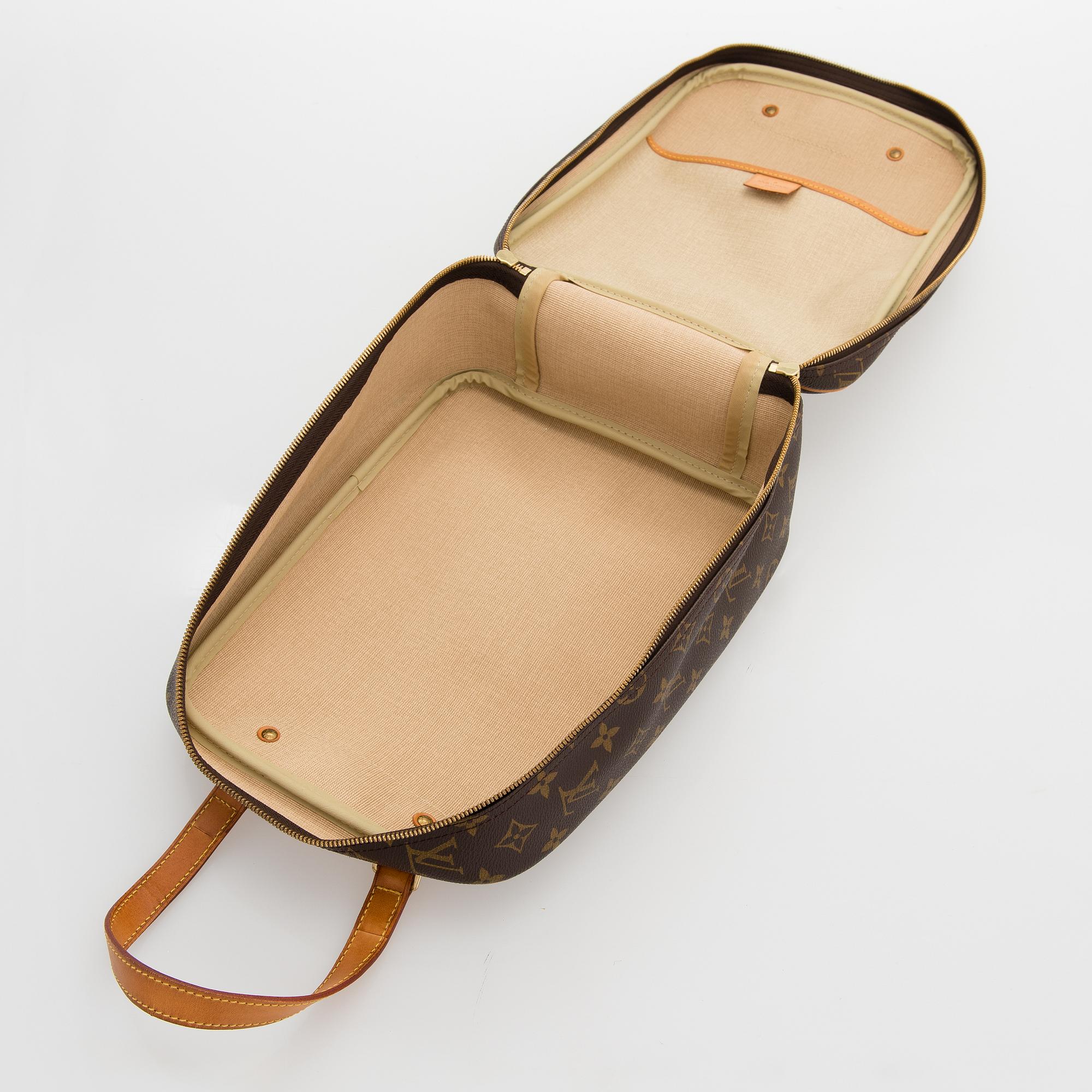 LOUIS VUITTON Monogram Canvas Excursion Bag.