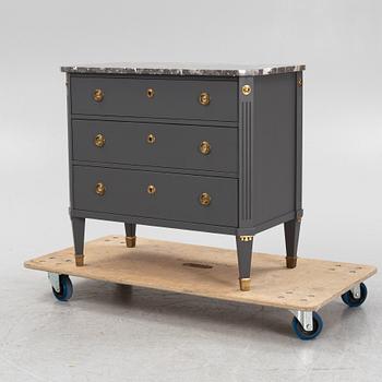 A Gustavian style chest of drawers, mid 20th Century.