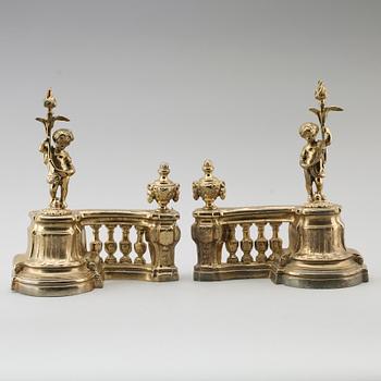 ELDHUNDAR, 1 par, förgylld metall, England, 1900-/2000-tal.