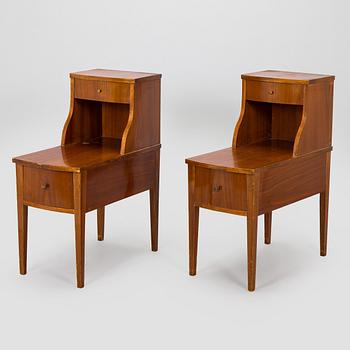 A pair of 20th century bedside tables.