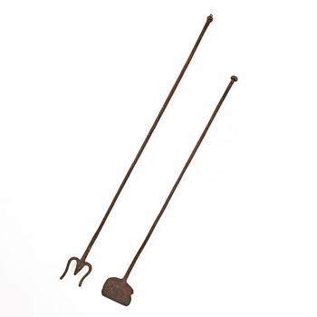 A set of two wrought iron fire pokers, 18th / 19th centiry.