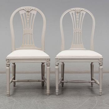 a set of 4+4 gustavian style chairs from the second half of the 20th century.