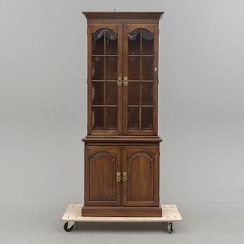 A second half of the 20th century vitrine cabinet marked "Pennsylvania House".