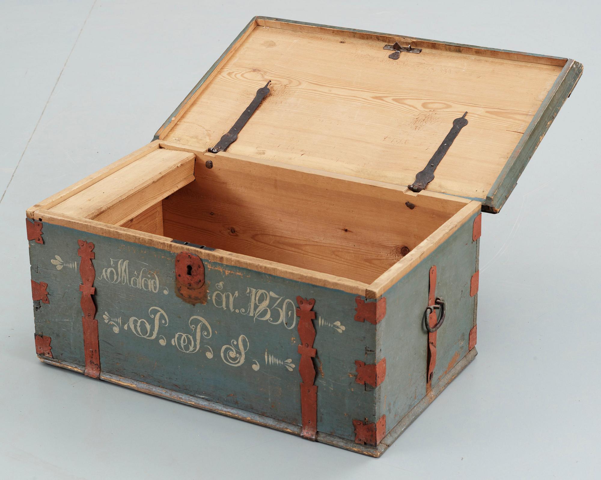 A Swedish wooden chest, marked 1830.