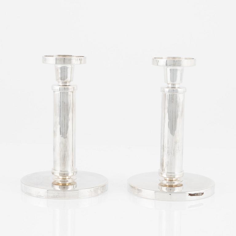 Rolf Carlman, a pair of sterling silver candlesticks, CF Carlman, Stockholm 1985.