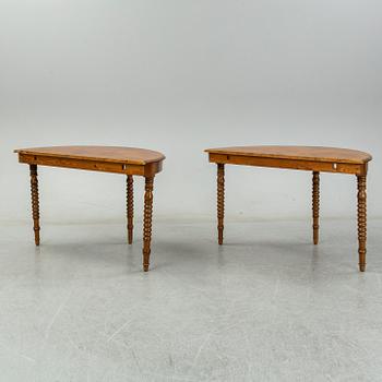 A two-piece birch dining table from around the year 1900.