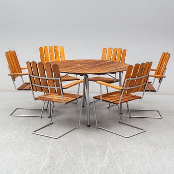 GRYTHYTTAN, a seven-piece suite of garden furniture, late 20th Century.