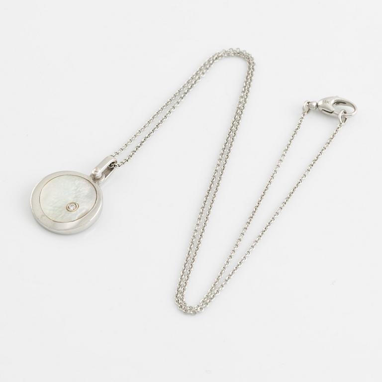 White gold, mother of pearl and round brilliant cut diamond necklace.