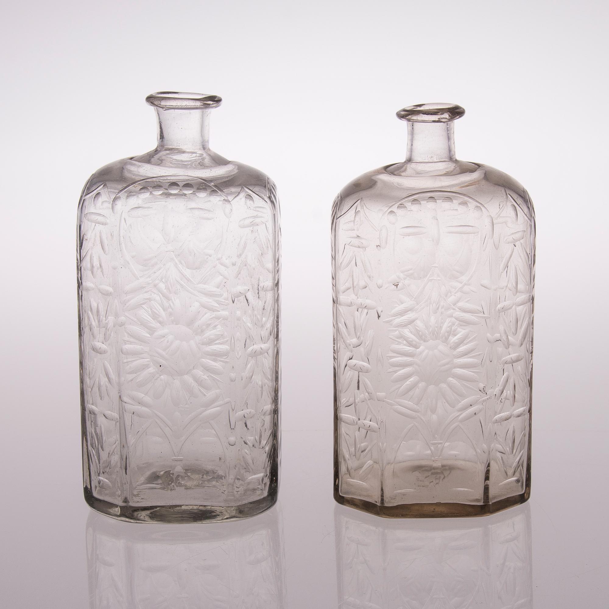 Two 18th century Baroque glass bottles.
