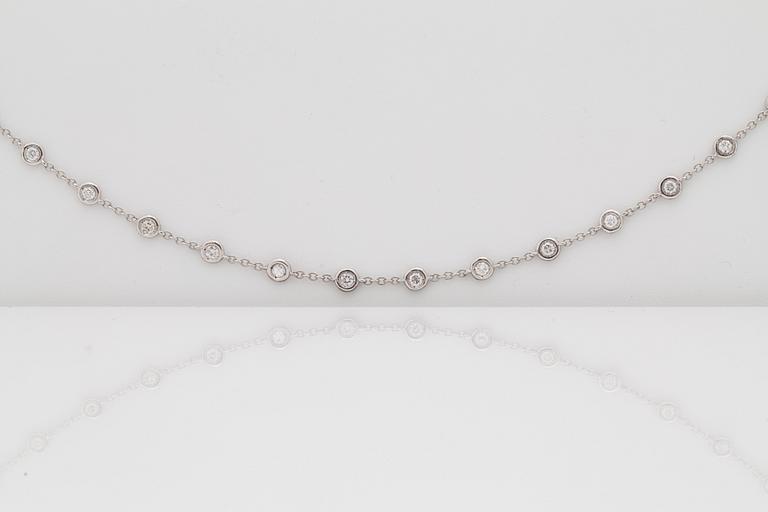 A btilliant cut diamond necklace. Total carat weight circa 4.95 cts. Quality circa H/SI.