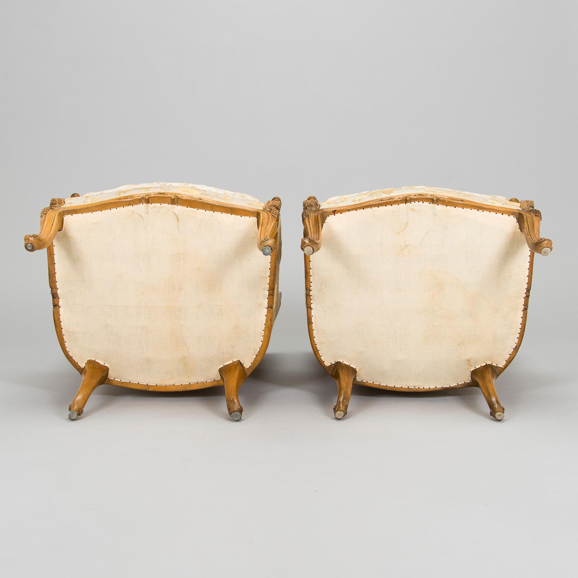 A pair of mid-20th-century French armchairs in Roccoco style.