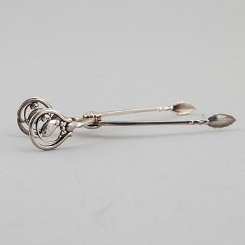Three silver tongs, Sweden and Denmark, 1834-1923.