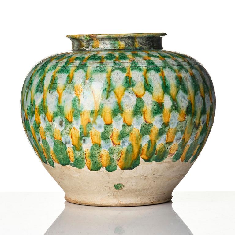 A sancai-glazed pottery jar, Tang dynasty (618-907).