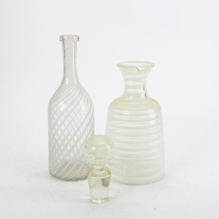 A set f two Italian mid 1900s glass decanters.