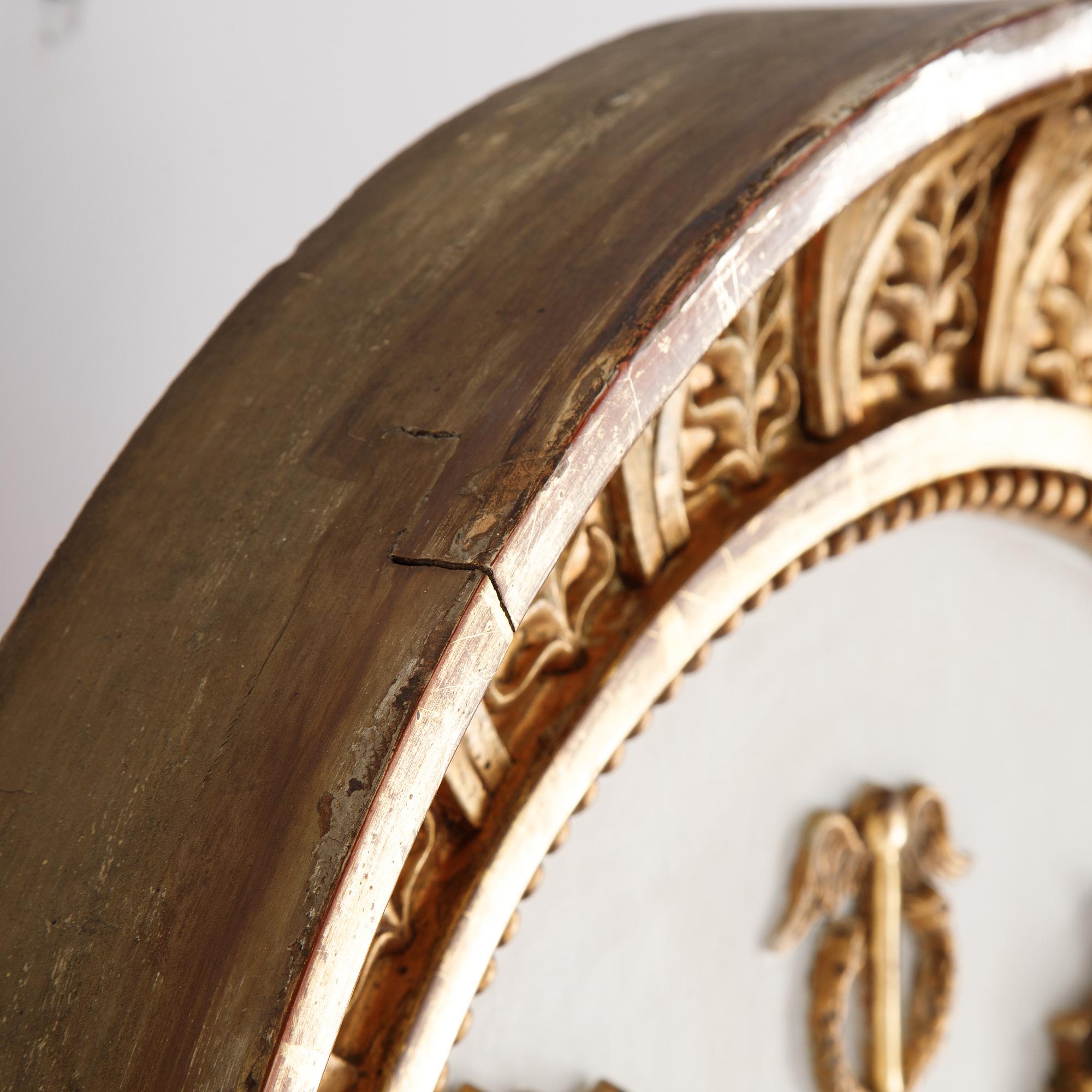 An Swedish Empire mirror, first half of the 19th century, attributed to Petter Gustaf Bylander, (Gothenburg 1802-59).