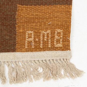 A flat weave carpet, c 210 x 130 cm, signed AMB.