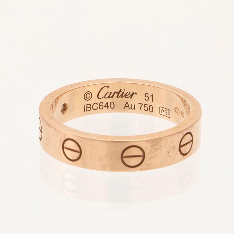 Cartier, ring 18K guld med en rund briljantslipad diamant.