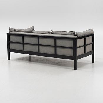 A lether sofa, later part of the 20th Century.