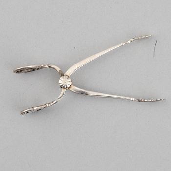 Three silver tongs, Sweden and Denmark, 1834-1923.