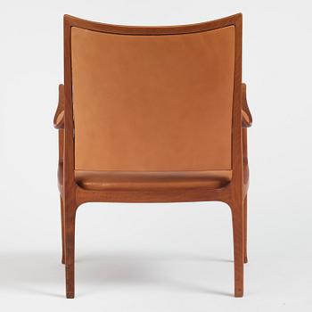 Hans Asplund, a walnut and leather easy chair, Nordiska Kompaniet, ca 1955, for the Nordiska Kompaniet beauty salon.