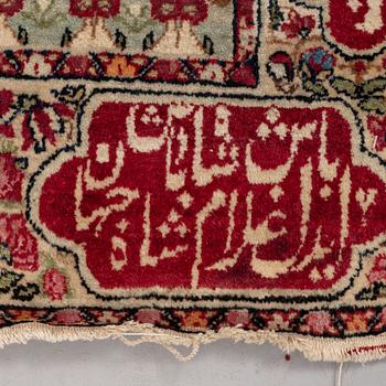 A rug, Antique Kerman Laver figural, ca 81 x 60 cm.
