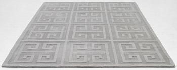 A 'Cubes' carpet, Layered, c. 270 x 180 cm.