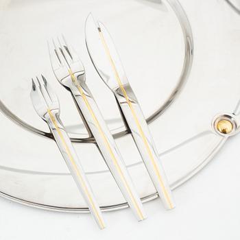 A 'Cromargan' stainless steel cutlery and a 7-piece service, Maxim's, WMF, Germany.