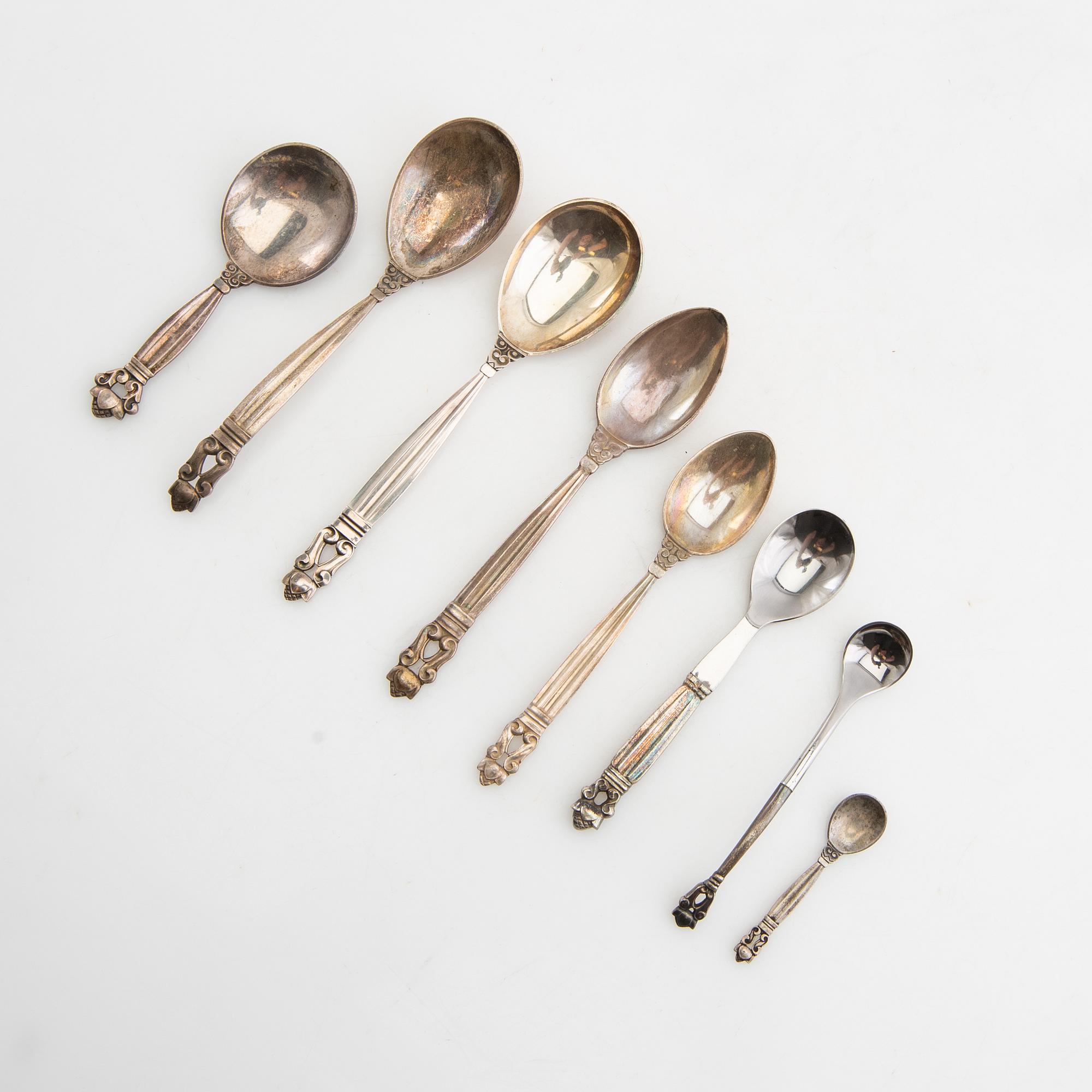 Johan Rohde, serveringsskedar 13 st "Konge/Achorn" sterlingsilver för Georg Jensen efter 1945.