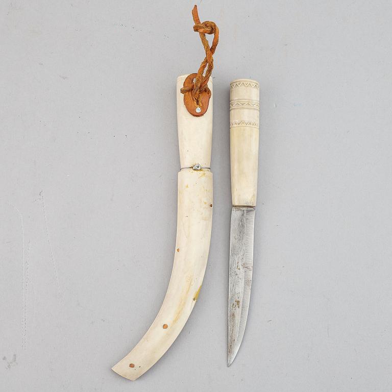 A reindeer horn Sami knife, signed SJ.