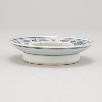 A porcelain stand for a cup, Qing dynasty, 19th Century.