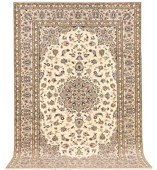 A Kashan carpet, c. 306 x 200 cm.