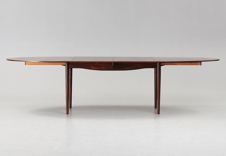 Finn Juhl, A Finn Juhl rosewood 'Judas' dining table, executed by Niels Vodder, Denmark 1960's.