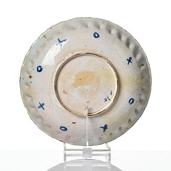 A group of three faience dishes, 18th century.