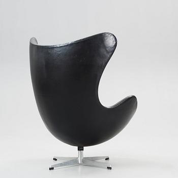 An Arne Jacobsen black leather 'Egg' chair, Fritz Hansen, Denmark 1964.