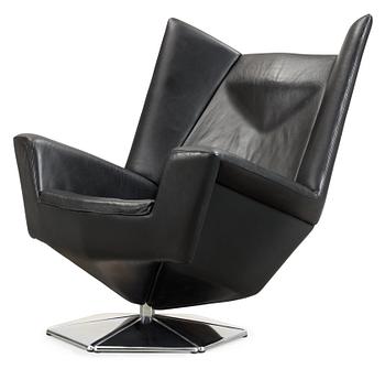 A Voitto Haapalainen black artificial leather and steel 'Prisma' easy chair, Tehokaluste Oy.