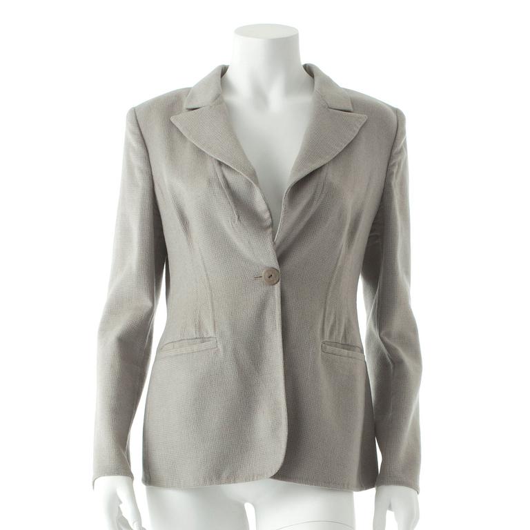 ARMANI, a grey cashmere jacket.