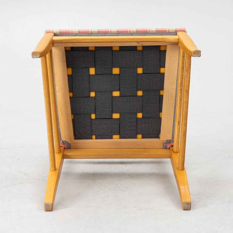 Carl Malmsten, a dining table with eight chairs, 'Camlare Nyckel', Sweden, second half of the 20th century.