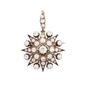 415. A 19th century gold and silver brooch/pendant set with old-cut diamonds.