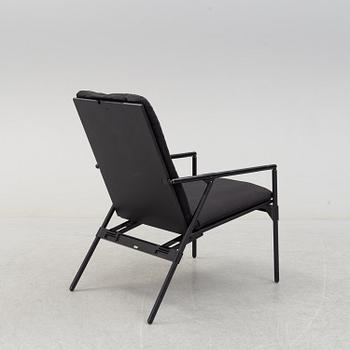 A 'Nena' folding chair by Richard Sapper, B&B Italia.