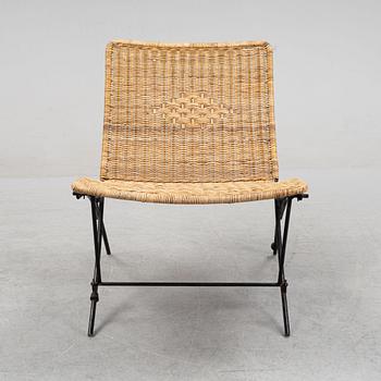 A rattan easy chair, 1960s.