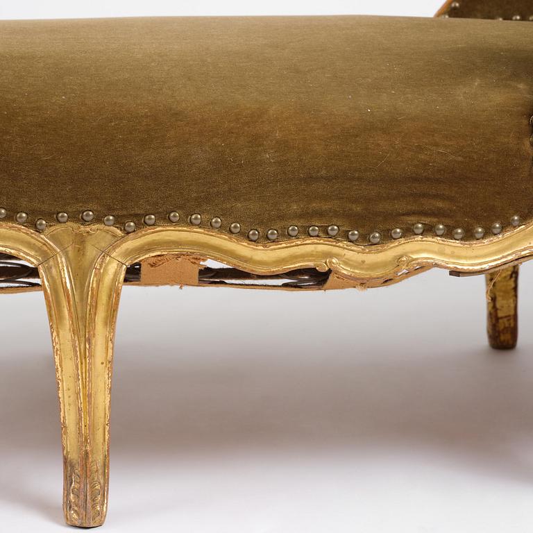 A French Louis Xv giltwood lit de repos, later part 18th century.