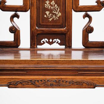 A pair of hardwood armchairs, late Qing dynasty.